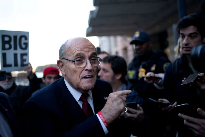FILE PHOTO: FILE PHOTO: Former New York Mayor Rudy Giuliani departs defamation lawsuit at the District Courthouse in Washington