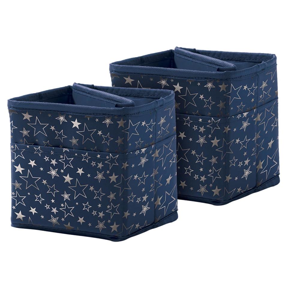 <p><a href="https://go.redirectingat.com?id=74968X1596630&url=https%3A%2F%2Fwww.michaels.com%2Fproduct%2Fcarson-dellosa-education-navy-with-silver-stars-tabletop-storage-box-2ct-D223349S&sref=https%3A%2F%2Fwww.goodhousekeeping.com%2Fhome-products%2Fg45085220%2Fbest-home-products-kids-september-2023%2F" rel="nofollow noopener" target="_blank" data-ylk="slk:Shop Now;elm:context_link;itc:0;sec:content-canvas" class="link ">Shop Now</a></p><p>Navy with Silver Stars Tabletop Storage Box</p><p>michaels.com</p><p>$18.99</p>