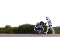 PERTH, AUSTRALIA - JULY 15: Stormtrooper Paul French is pictured on day 5 of his over 4,000 kilometre journey from Perth to Sydney walking down Old Mandurah Road on July 15, 2011 in Perth, Australia. French aims to walk 35-40 kilometres a day, 5 days a week, in full Stormtrooper costume until he reaches Sydney. French is walking to raise money for the Starlight Foundation - an organisation that aims to brighten the lives of ill and hostpitalised children in Australia. (Photo by Paul Kane/Getty Images)