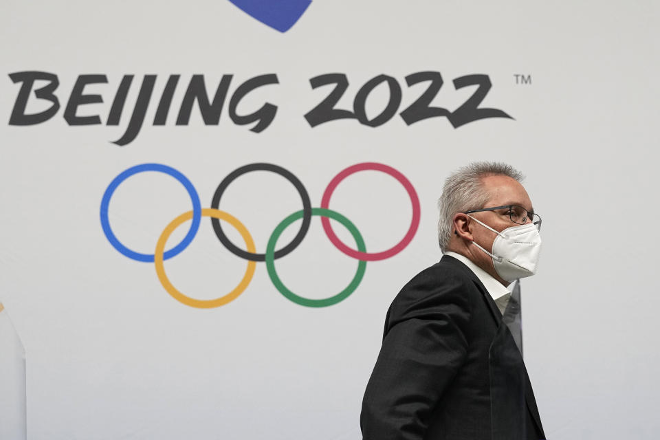 Court of Arbitration for Sport director general Matthieu Reeb leaves after a press conference at the 2022 Winter Olympics, Monday, Feb. 14, 2022, in Beijing. The Court ruled after a hastily arranged hearing that lasted into early Monday morning that the 15-year-old Kamila Valieva, the favorite for the women's individual gold, does not need to be provisionally suspended ahead of a full investigation. (AP Photo/Sue Ogrocki)