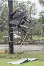 <p>A wooden structure is embedded in backstop of a baseball field in Fort Walton Beach, Fla., June 21, 2017. A line of severe weather from Tropical Storm Cindy battered this northwest Florida community early Wednesday morning. (Photo: Devon Ravine/Northwest Florida Daily News via AP) </p>