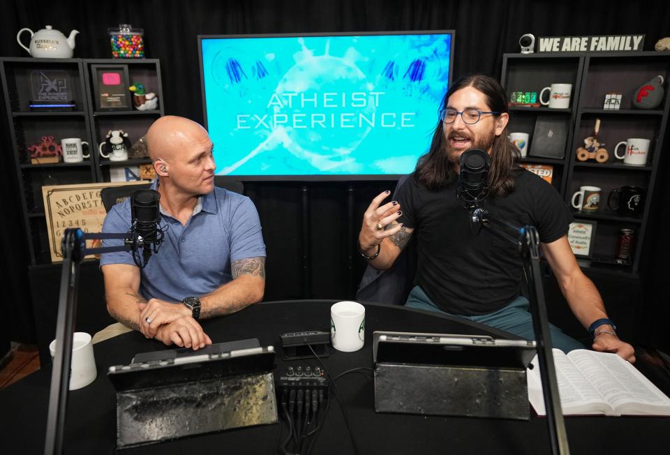 Christy Powell, right, and Jimmy Jr. host “The Atheist Experience” call-in talk show at the Atheist Community of Austin Freethought Library on Sunday June 25, 2023.