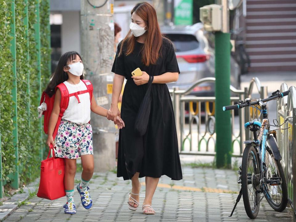 YONHAP/AFP via Getty Images