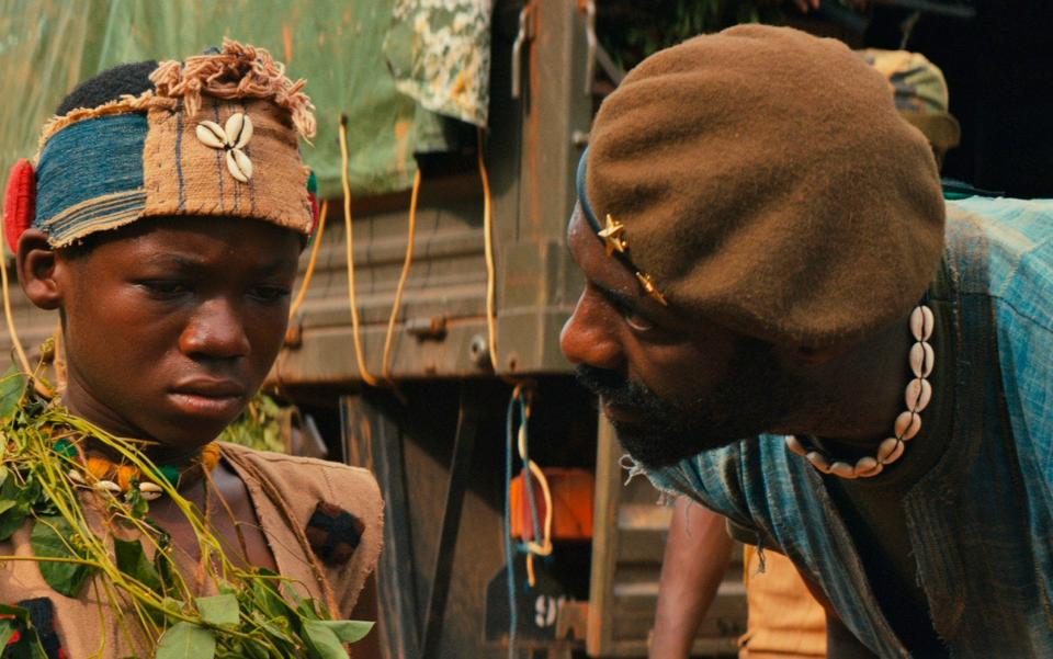 The beast before Bond: Abraham Attah (left) and Idris Elba in Beasts of No Nation - Netflix/AP