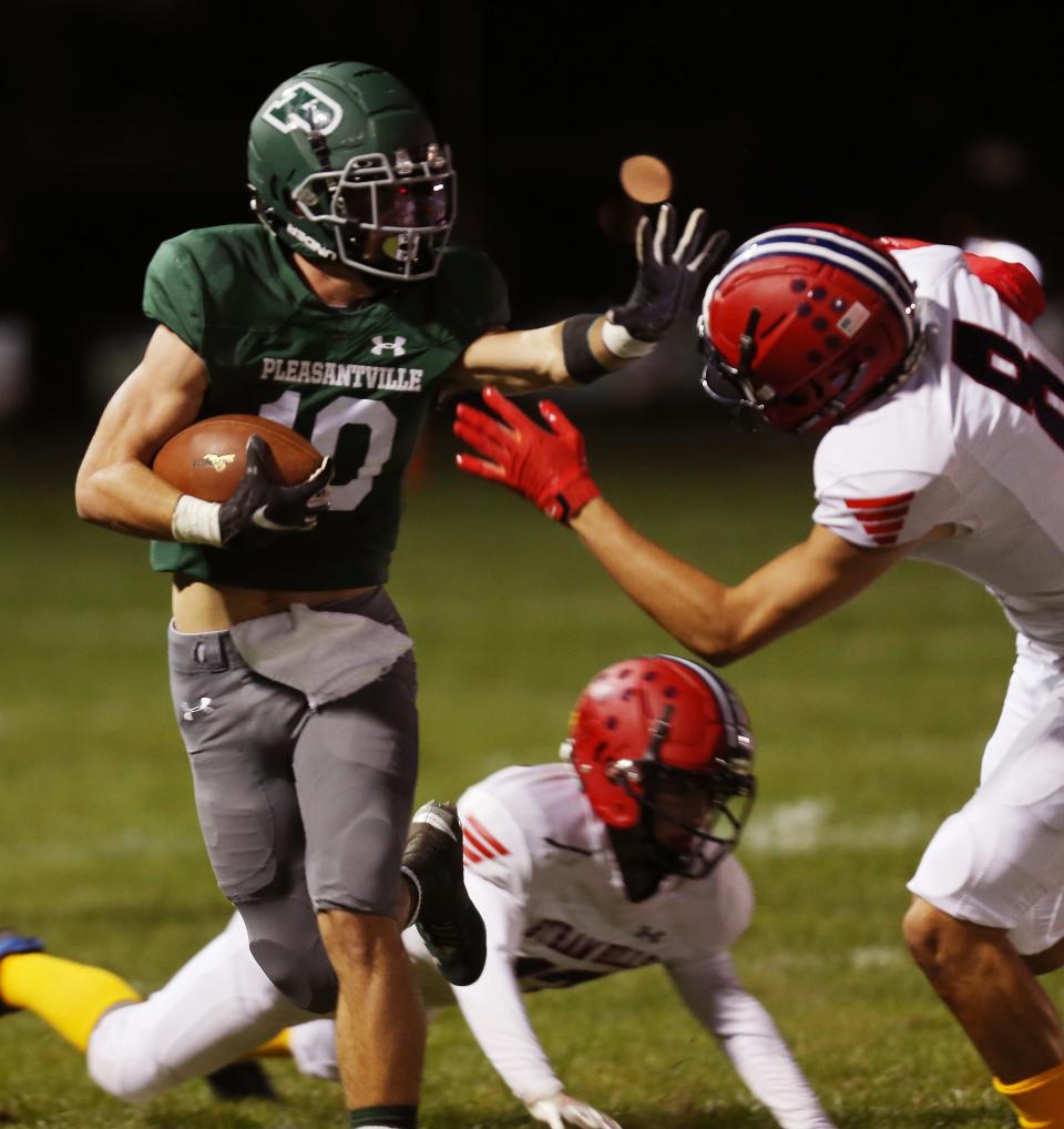 Pleasantville's Daniel Picart (10) looks for some running room in the Byram Hills defense during football action at Parkway Field in Pleasantville Sept. 30, 2022. Pleasantville won the game 17-14.