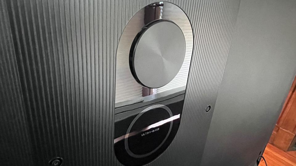 TCL QM8 showing back panel subwoofer