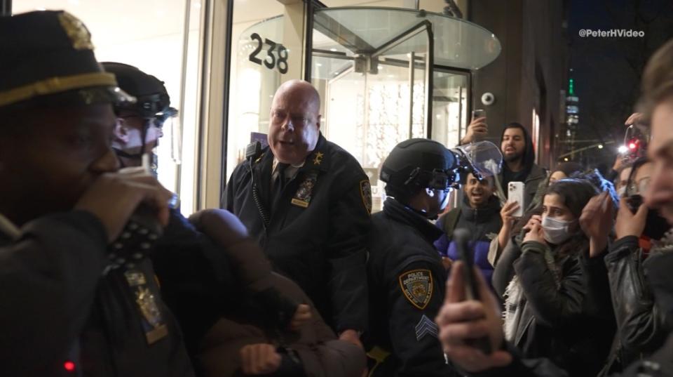 Video shows NYPD Assistant Chief James McCarthy and his officers being chased and surrounded by protesters Monday night while trying to get inside the NYU Catholic Center after arresting one of them. Peter Hambrecht