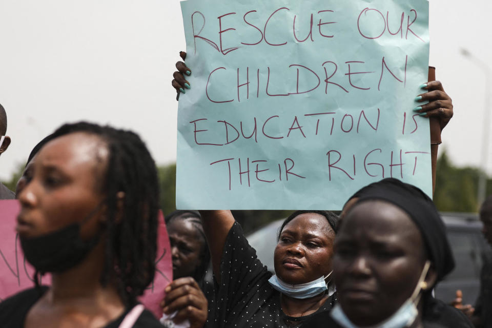 Parents and relatives of students from the Federal College of Forestry Mechanization in Kaduna who were abducted hold placards during a demonstration in Abuja, Nigeria, May 4, 2021 to demand the release of the government do more to rescue kidnapped students. / Credit: KOLA SULAIMON/AFP/Getty