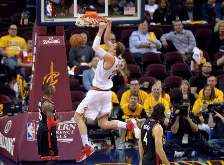 May 17, 2016; Cleveland, OH, USA; Cleveland Cavaliers center Timofey Mozgov (20) dunks in the fourth quarter against the Toronto Raptors in game one of the Eastern conference finals of the NBA Playoffs at Quicken Loans Arena. Mandatory Credit: David Richard-USA TODAY Sports