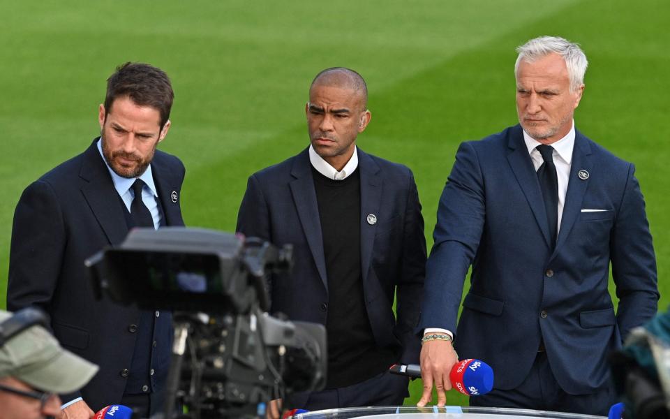 Sky Sports commentator (L) waits pitch-side with former Newcastle players Kieron Dyer (C) and David Ginola (R) ahead of the English Premier League football match between Newcastle United and Tottenham Hotspur at St James' Park in Newcastle-upon-Tyne - PAUL ELLIS/AFP via Getty Images