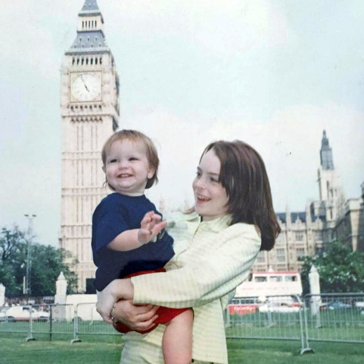 Lindsay Lohan and her brother Dakota take a picture by London's Big Ben tower during her 