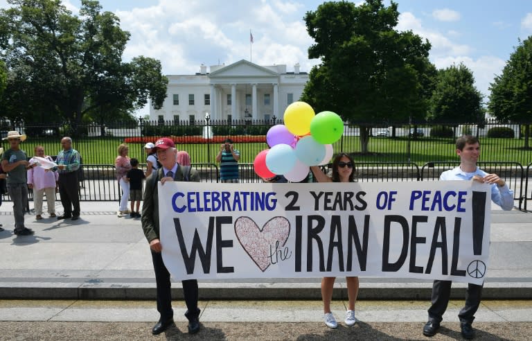 Activist take part in a rally to commemorate the nuclear deal with Iran, in front of the White House, Washington, DC, on July 14, 2017