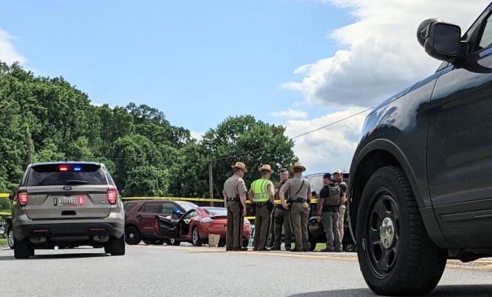 Police from several agencies work at the scene of an incident at Mapleville Road and Mount Aetna Road south of Smithsburg.