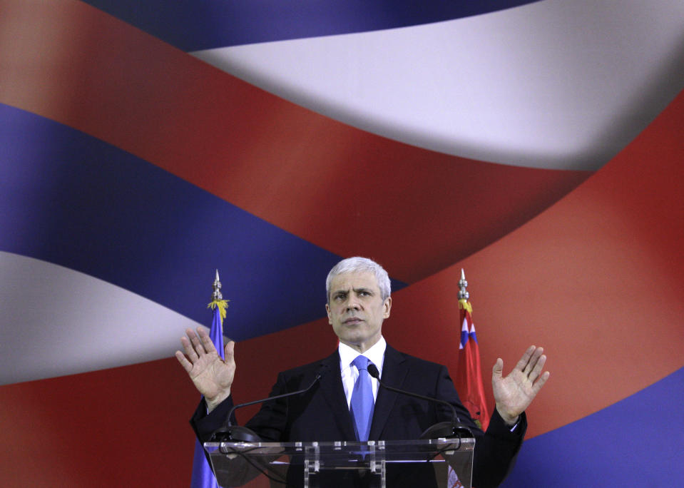 Serbia's President Boris Tadic speaks and gestures during a press conference, in Belgrade, Serbia, Friday, March 2, 2012. European Union foreign ministers decided Tuesday that Serbia should become a candidate for membership in the bloc after it reached a key agreement with its former province of Kosovo. (AP Photo/Darko Vojinovic)