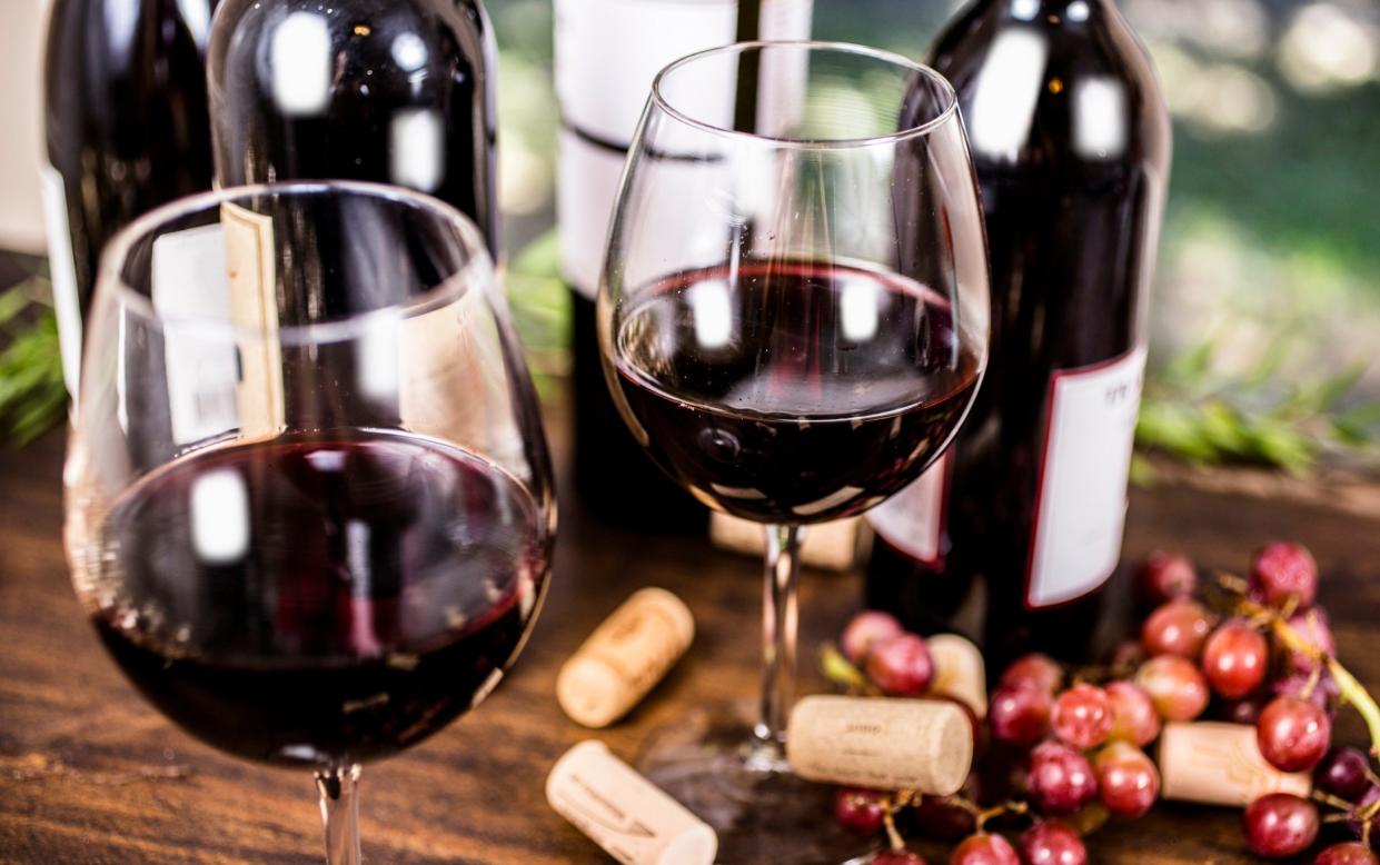Professor Tim Spector suggested drinking wine early on in a meal to stop the drink damaging health - Getty Images