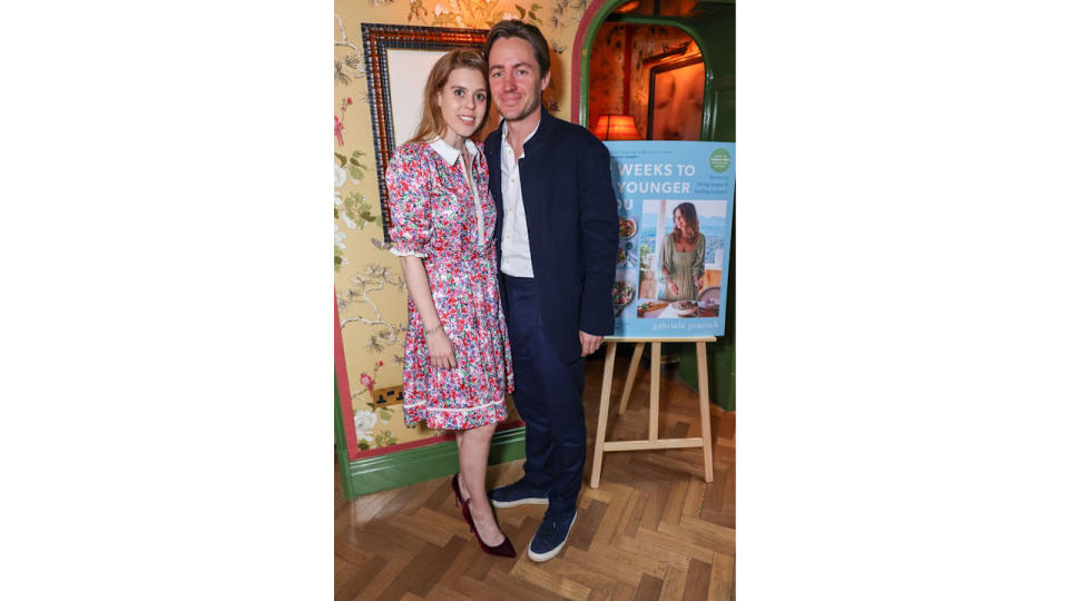 Princess Beatrice wearing a pink floral dress with husband Edoardo