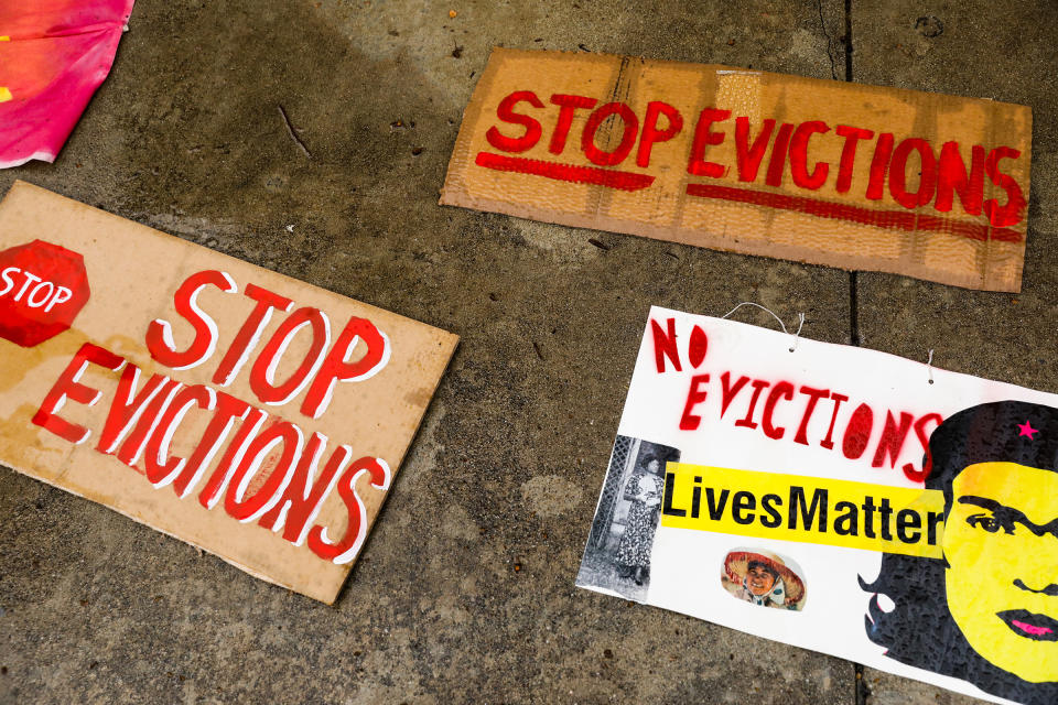 Signage lays on the ground during a protest outside the Santa Clara County Courthouse in San Jose to halt eviction proceedings from taking place on Jan. 27. Although rent moratoriums were instituted to help people who lost their jobs due to coronavirus shutdowns, certain types of eviction actions are still going forward.<span class="copyright">Gabrielle Lurie—The San Francisco Chronicle/Getty Images</span>