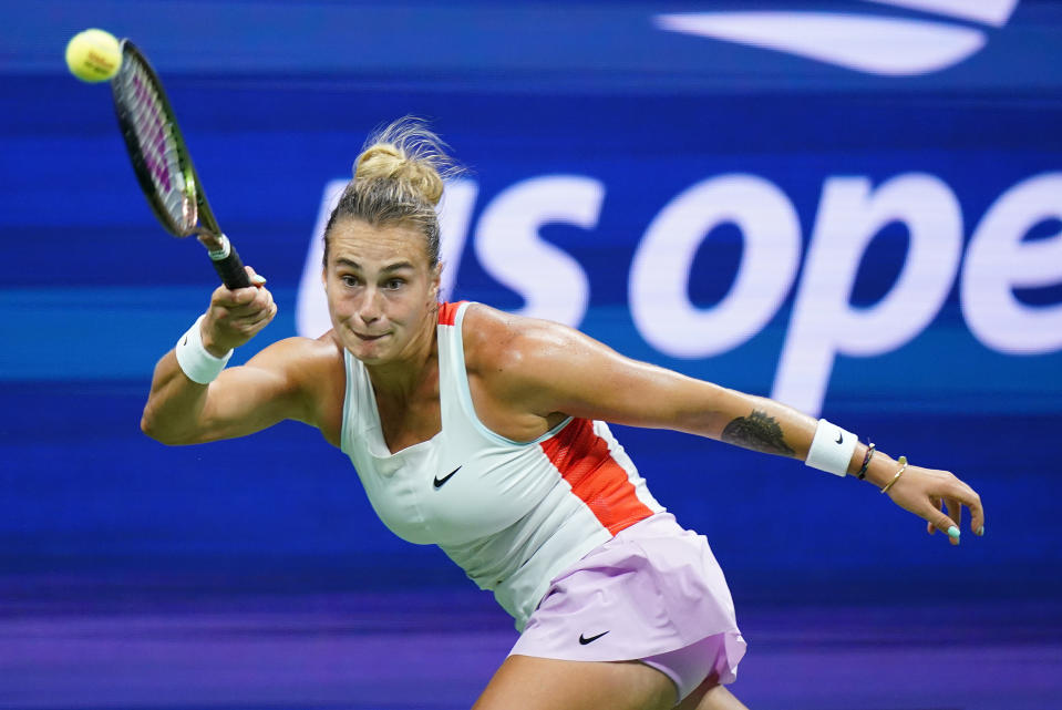 Aryna Sabalenka, of Belarus, returns a shot to Iga Swiatek, of Poland, during the semifinals of the U.S. Open tennis championships, Thursday, Sept. 8, 2022, in New York. (AP Photo/Frank Franklin II)