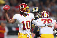 Robert Griffin III #10 of the Washington Redskins passes against the St. Louis Rams at the Edward Jones Dome on September 16, 2012 in St. Louis, Missouri. (Photo by Dilip Vishwanat/Getty Images)