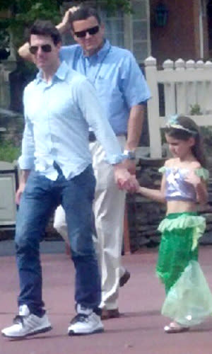 Katie Holmes flashes her boob at tea with Suri as Tom Cruise hits back