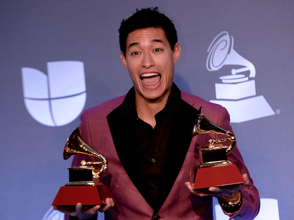 US/Peruvian musician Tony Succar poses in the press room with the awards for "Best Salsa Album" and "Producer of the Year" during the 20th Annual Latin Grammy Awards in Las Vegas, Nevada, on November 14, 2019.