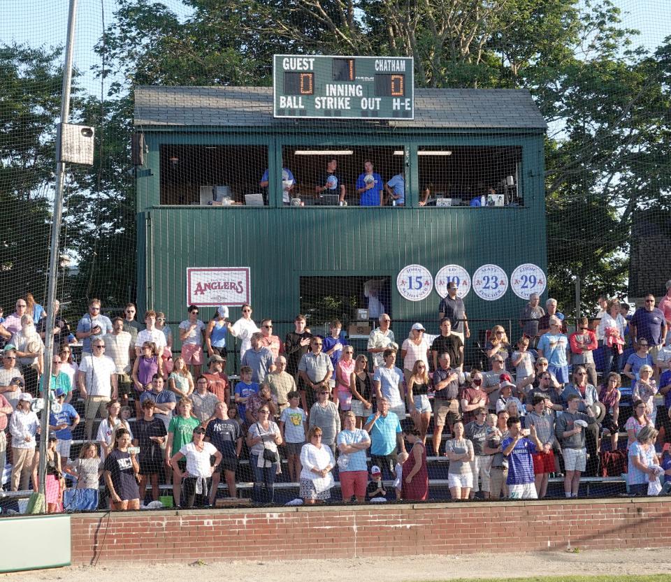 CHATHAM   07/13/22     Fans stand for the National Anthem before the game between Chatham and Hyannis at Veterans field.