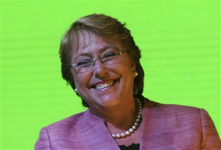 Chilean presidential candidate Michelle Bachelet attends a meeting after leading in the first round of presidential election in Santiago, November 17, 2013. REUTERS/Maglio Perez