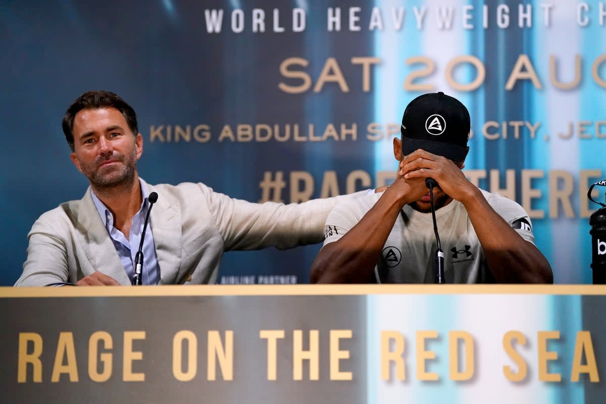 Hearn consoling Anthony Joshua after the heavyweight’s second loss to Oleksandr Usyk (PA Wire)