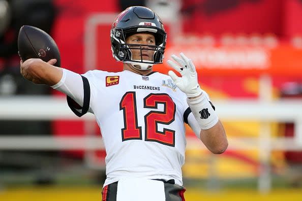 TAMPA, FL - FEBRUARY 07: Tom Brady (12) of the Buccaneers drops back to pass during the Super Bowl LV game between the Kansas City Chiefs and the Tampa Bay Buccaneers on February 7, 2021 at Raymond James Stadium, in Tampa, FL. (Photo by Cliff Welch/Icon Sportswire via Getty Images)