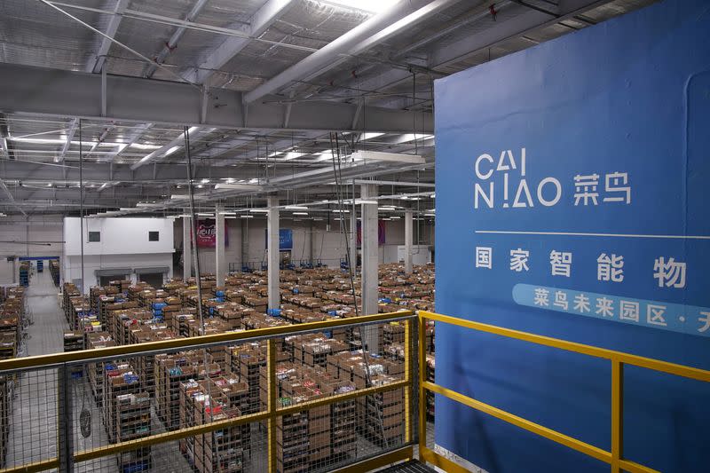 FILE PHOTO: Cainiao's logo, Alibaba's logistics unit, is seen at the warehouse in Wuxi