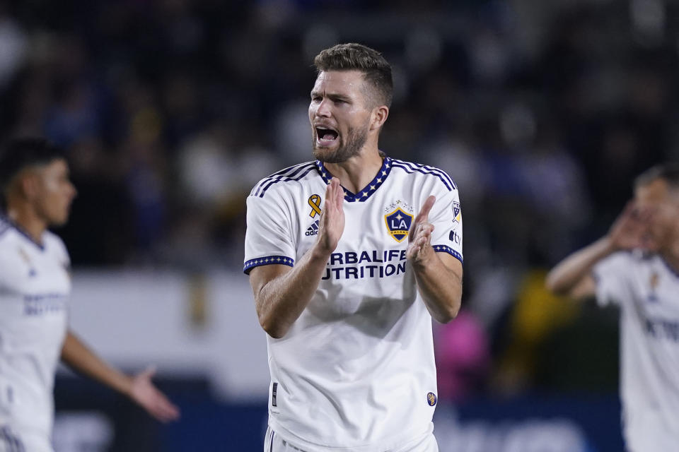 LA Galaxy defender Eriq Zavaleta applauds after scoring a goal against the Portland Timbers during the first half of an MLS soccer match Saturday, Sept. 30, 2023, in Carson, Calif. (AP Photo/Ryan Sun)