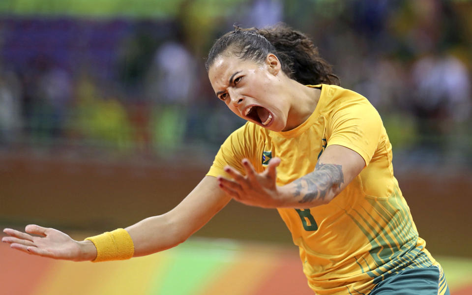 <p>Fernanda Da Silva of Brazil celebrates a goal during a women’s handball match against Montenegro at Future Arena in Rio on August 14, 2016. (REUTERS/Damir Sagolj) </p>