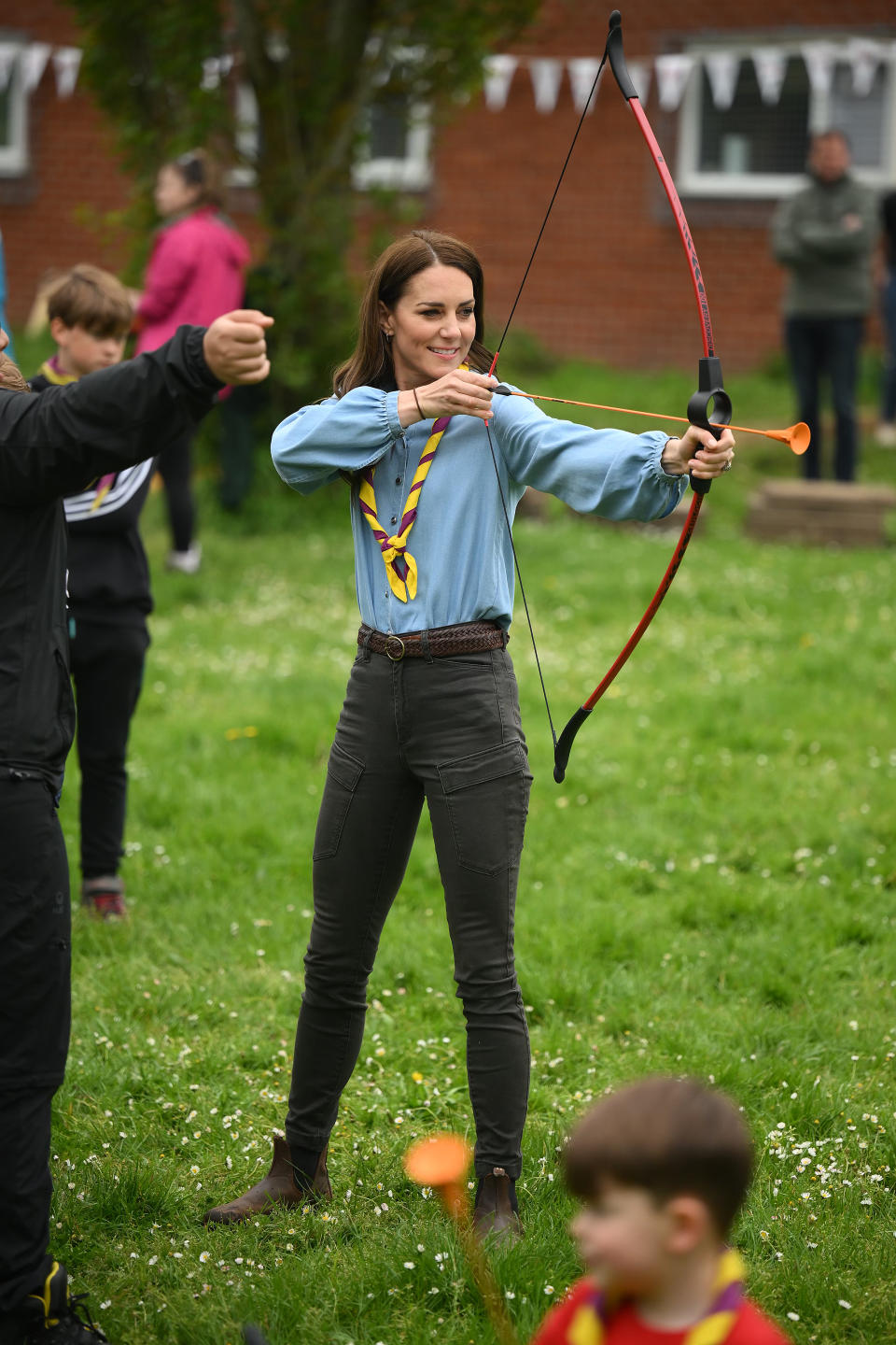 Kate Middleton just stepped out in a pair of $230 CAD/$210 USD Blundstone boots (Getty)., LONDON, ENGLAND - MAY 08: Princess of Wales, tries her hand at archery while taking part in the Big Help Out, during a visit to the 3rd Upton Scouts Hut in Slough on May 8, 2023 in London, England. The Big Help Out is a day when people are encouraged to volunteer in their communities. It is part of the celebrations of the Coronation of Charles III and his wife, Camilla, as King and Queen of the United Kingdom of Great Britain and Northern Ireland, and the other Commonwealth realms that took place at Westminster Abbey on Saturday, May 6, 2023. (Photo by Daniel Leal - WPA Pool/Getty Images)