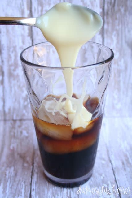 <p>Add a large dollop of sweetened, condensed milk for a rich, creamy version.</p><p>Get the tutorial from <a href="http://dukesandduchesses.com/2013/06/vietnamese-iced-coffee?showComment=1371228647929#c7590057986817475" rel="nofollow noopener" target="_blank" data-ylk="slk:Dukes and Duchesses;elm:context_link;itc:0;sec:content-canvas" class="link ">Dukes and Duchesses</a>.</p>
