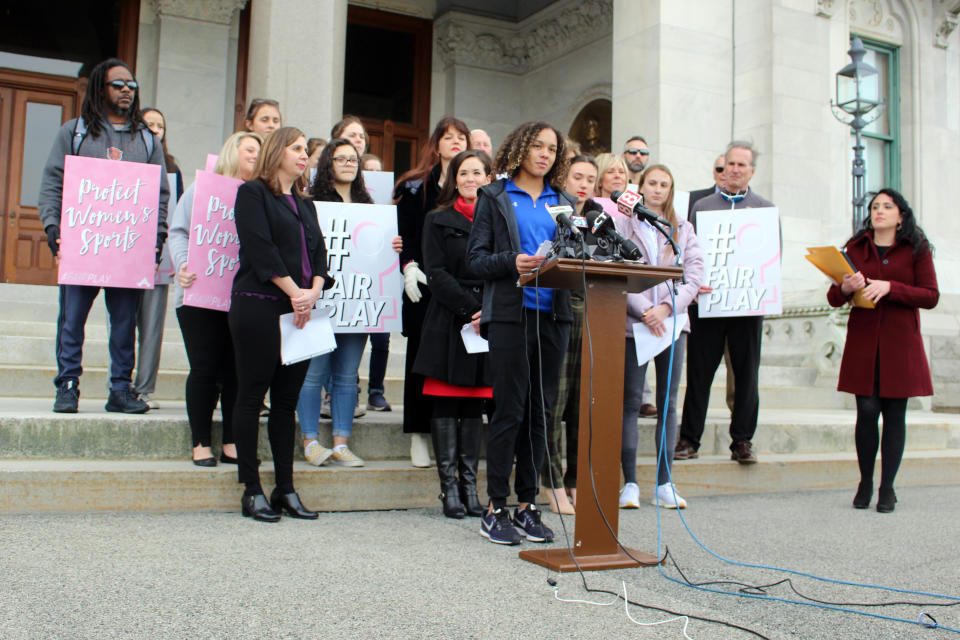 Danbury High School sophomore Alanna Smith speaks during a news conference at the Connecticut State Capitol in Hartford, Conn., Wednesday, Feb, 12, 2020. Smith, the daughter of former Major League pitcher Lee Smith, is among three girls suing to block a state policy that allows transgender athletes to compete in girls sports. (AP Photo/Pat Eaton-Robb)