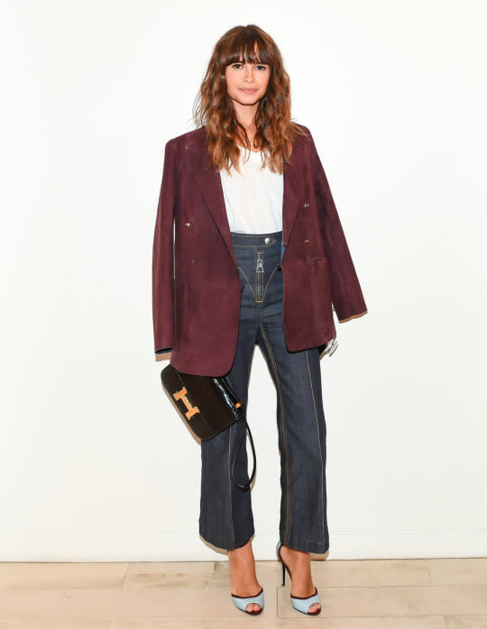 <p>She might be wearing jeans and a t-shirt, but this is Miroslava Duma we’re talking about. The jeans are Louis Vuitton, the top Celine, and the bag? Hermes, of course.</p>