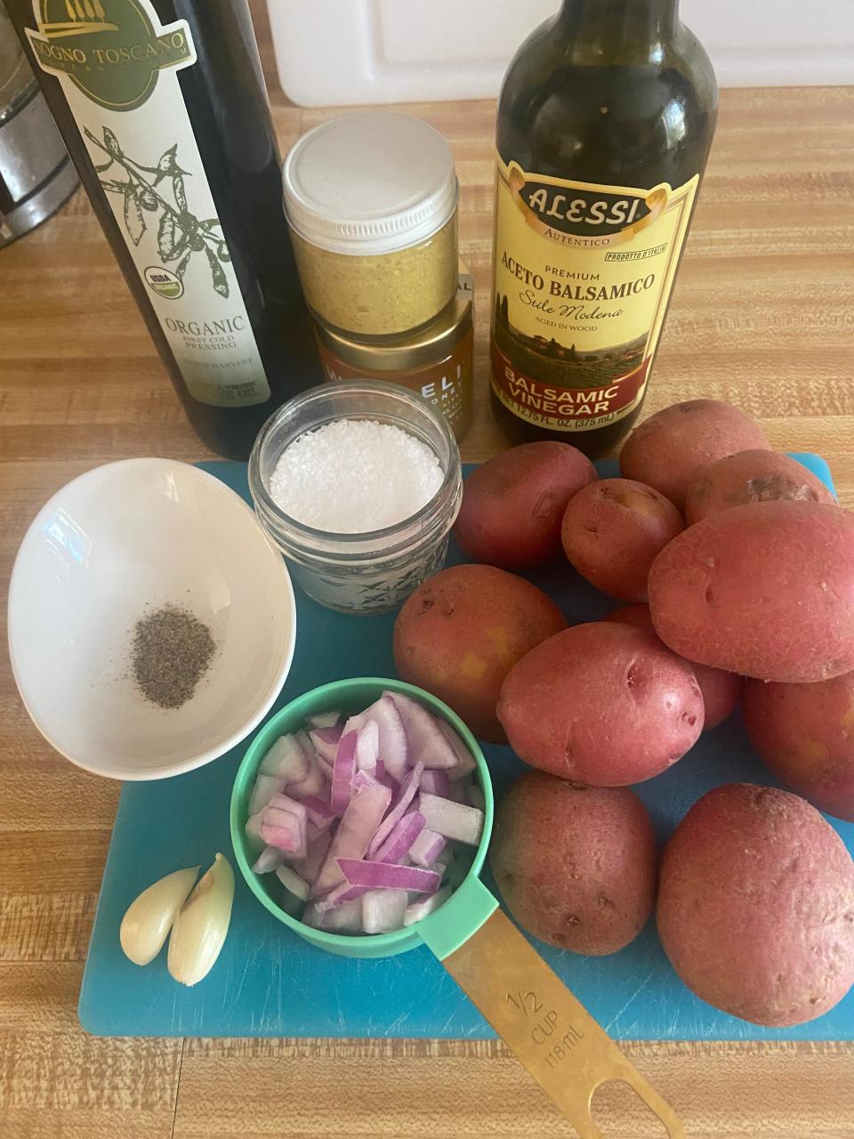 ingredients for balsamic vinegar potato salad on a kitchen counter