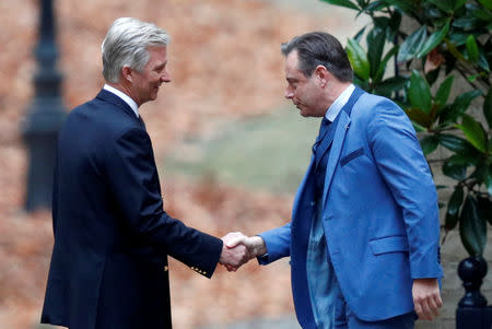 Belgium's King Philippe welcomes Bart De Wever, President of Flemish right-wing party N-VA, ahead of political talks at the Royal Palace in Brussels, Belgium December 19, 2018. REUTERS/Francois Lenoir