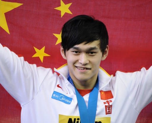 China's gold medalist Sun Yang celebrates after taking a gold medal at the FINA World Championships in July 2011. China has announced a team of 396 athletes for the London Olympics, including Sun, who is tipped to become China's first Olympic male swimming champion