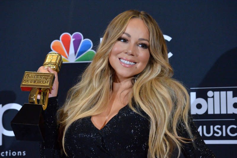 Mariah Carey appears backstage after winning the Icon award during the 2019 Billboard Music Awards at the MGM Grand Garden Arena in Las Vegas on May 1. The singer turns 54 on March 27. File Photo by Jim Ruymen/UPI