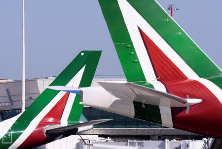 FILE PHOTO: Alitalia airplanes pictured at Leonardo da Vinci-Fiumicino Airport in Rome, Italy, March 30, 2019. REUTERS/Alberto Lingria