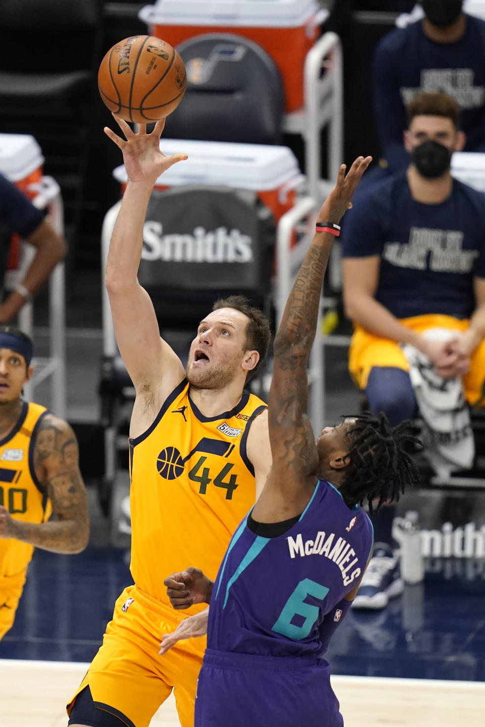 Utah Jazz forward Bojan Bogdanovic (44) lays the ball up as Charlotte Hornets forward Jalen McDaniels (6) defends in the first half during an NBA basketball game Monday, Feb. 22, 2021, in Salt Lake City. (AP Photo/Rick Bowmer)