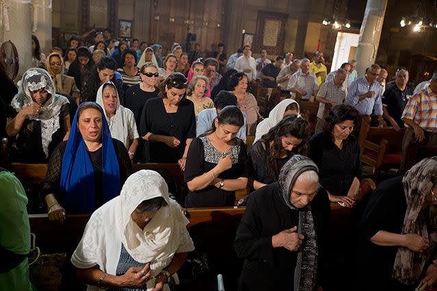 Coptic Christians attend prayers for the departed, remembering the victims of EgyptAir flight 804 at Al-Boutrossiya Church, in the main Coptic Cathedral complex, Cairo. Source: AP