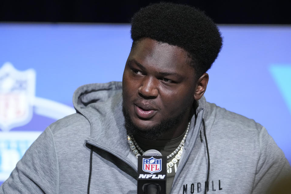 Alabama defensive lineman Byron Young speaks during a press conference at the NFL football scouting combine in Indianapolis, Wednesday, March 1, 2023. (AP Photo/Michael Conroy)