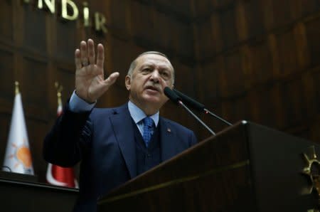 Turkish President Tayyip Erdogan addresses members of the parliament from his ruling AK Party during a meeting in Ankara, Turkey April 24, 2018. Murat Cetinmuhurdar/Presidential Palace/Handout via REUTERS