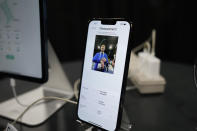 Matt Fischer participates in a demonstration video of FaceHeart during CES Unveiled before the start of the CES tech show Sunday, Jan. 7, 2024, in Las Vegas. FaceHeart is a health monitoring software that utilizes AI image recognition to measure vital signs through video. (AP Photo/Ryan Sun)