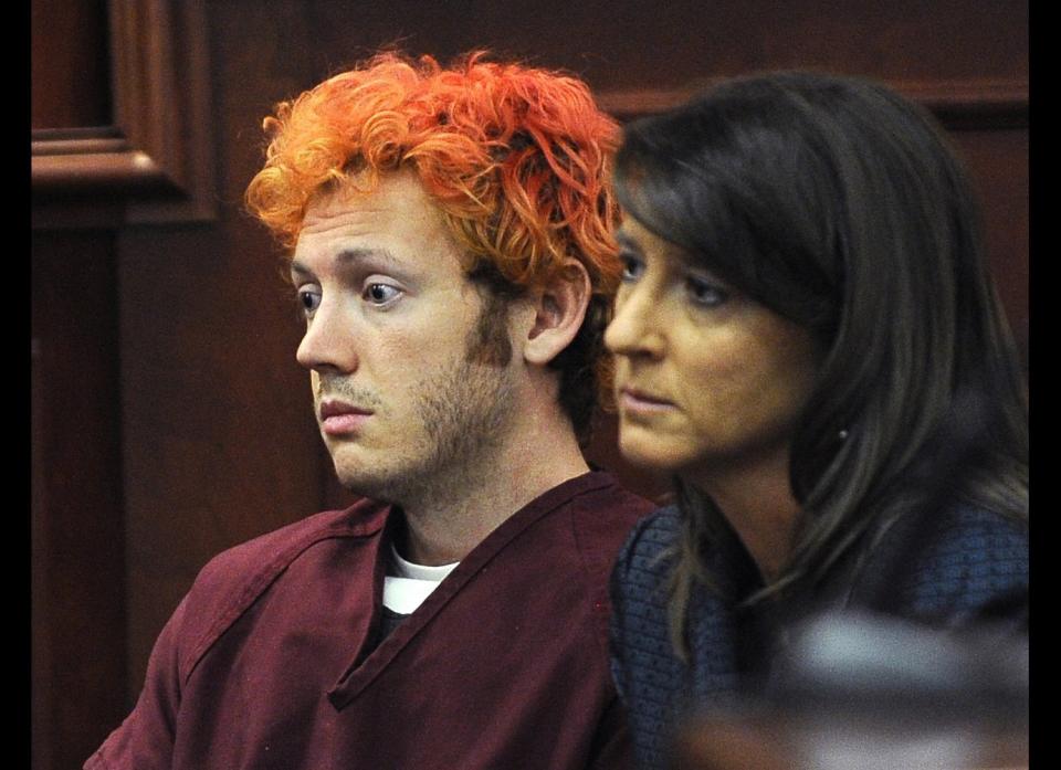 A masked gunman kills 14 people and wounds 50 others when he opens fire on moviegoers at a showing of new Batman film "The Dark Knight Rises" in Aurora, a suburb of Denver, Colorado.<br>  <em>Caption: In this Monday, July 23, 2012, file photo, James Holmes, appears in Arapahoe County District Court, with defense attorney Tamara Brady in Centennial, Colo. (AP Photo/Denver Post, RJ Sangosti, Pool, File)</em>