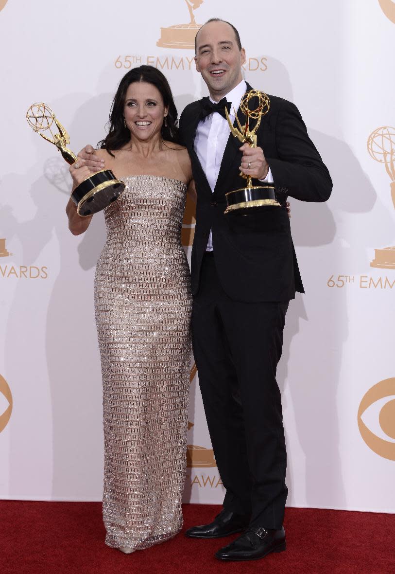 Julia Louis-Dreyfus winner of the award for outstanding supporting actress in a comedy series for her role on "Veep" poses with Tony Hale winner of the award for outstanding supporting actor in a comedy series for his role on "Veep" at the 65th Primetime Emmy Awards at Nokia Theatre on Sunday Sept. 22, 2013, in Los Angeles. (Photo by Dan Steinberg/Invision/AP)