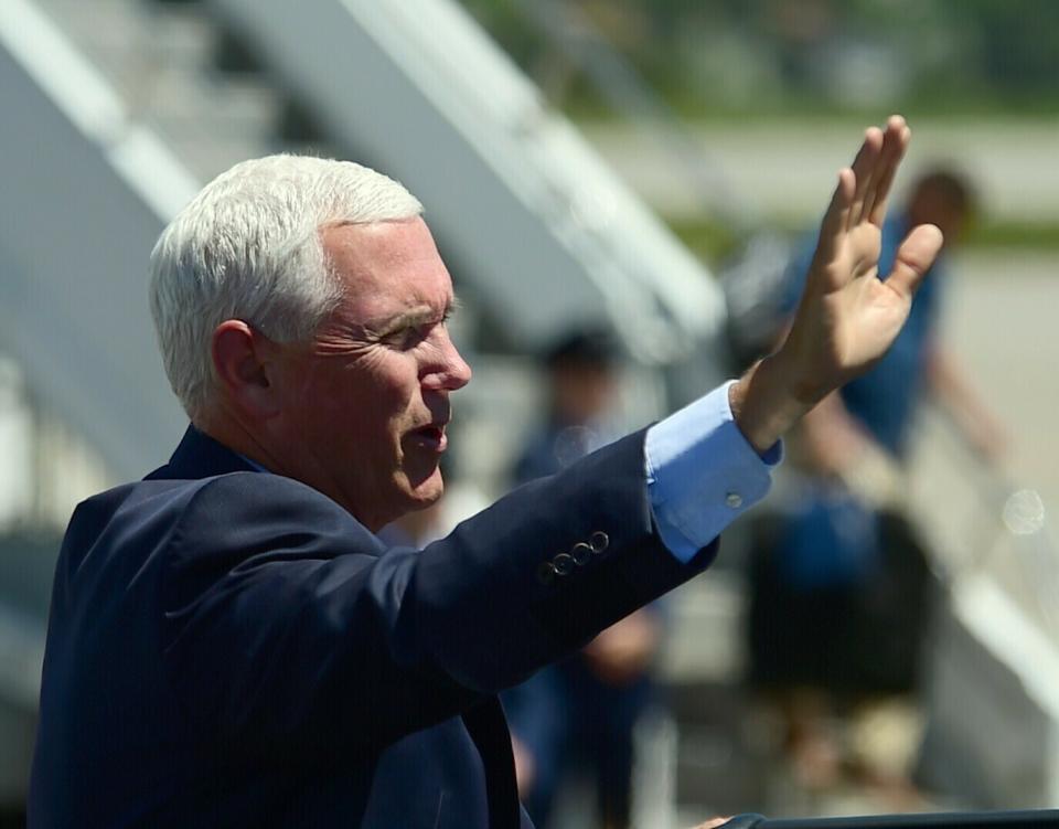 Vice President Mike Pence waves to supporters at the airport in Billings, Mont. on Wednesday, June 12, 2019. (Larry Mayer/Billings Gazette via AP)