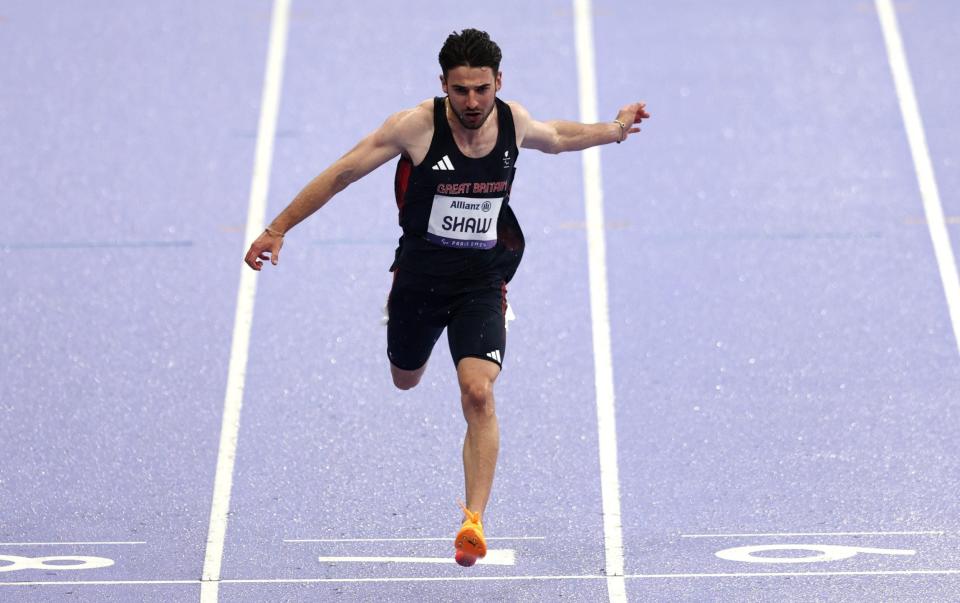 Zachary Shaw of Team Great Britain crosses the finish line during the Men's 100m T12 heat on day two of the Paris 2024 Summer Paralympic Games at Stade de France on August 30, 2024 in Paris, France